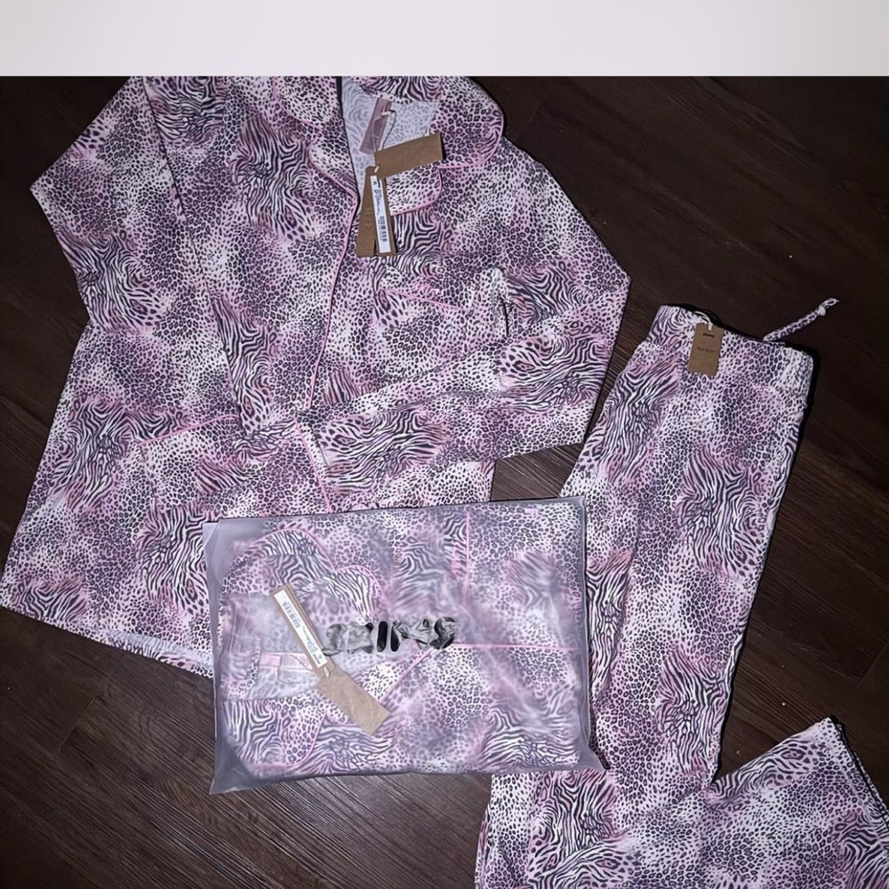 SKIMS Pink and Black Animal Print Pajama Set